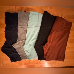 5 pair size L Athleta Ultra High Rise Elation 7/8 Legging & 1 pair Transcend 7/8